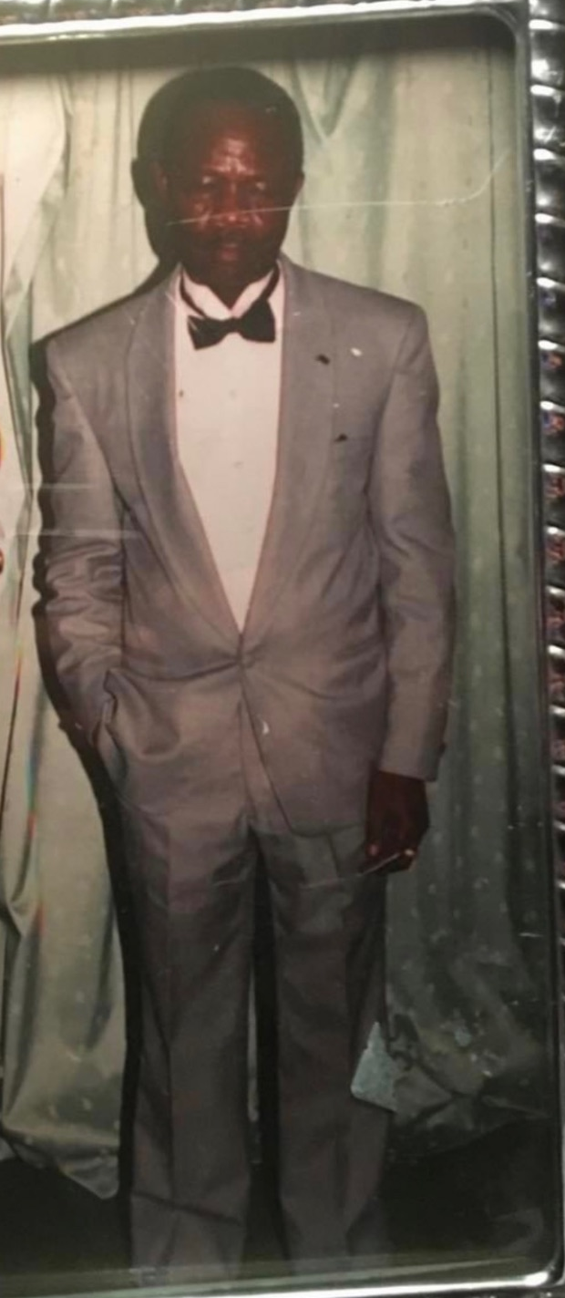 Joseph in gray suit with bow tie